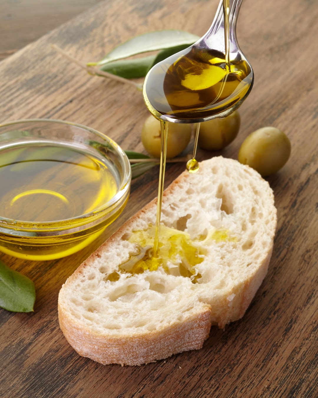 extra virgin olive oil on a slice of bread