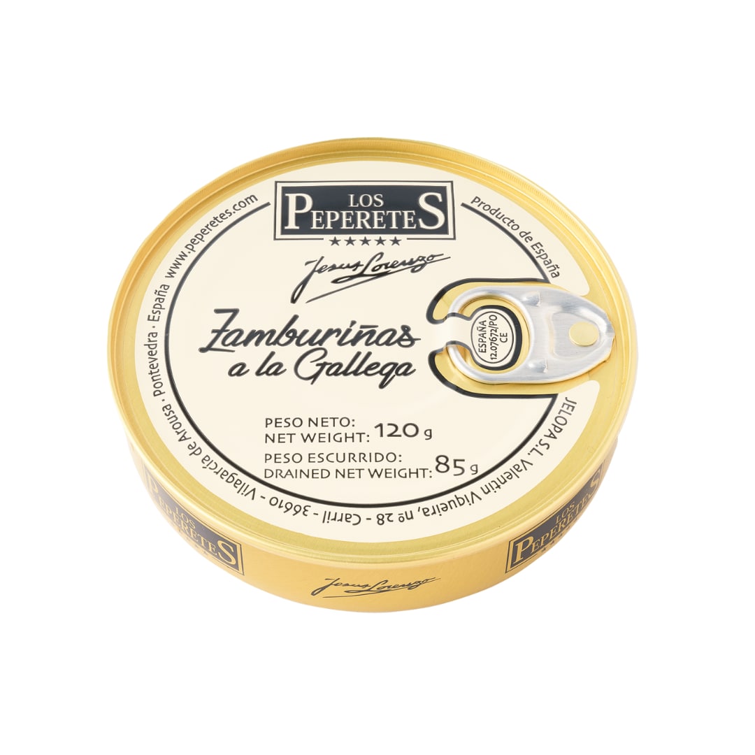 A sealed can of LOS PEPERETES Galician-Style Scallops, featuring a metal pull-tab, has a net weight of 120g and drained weight of 85g. The label showcases Los Peperetes and Producto de España, offering the genuine flavor of Zamburiñas expertly crafted.