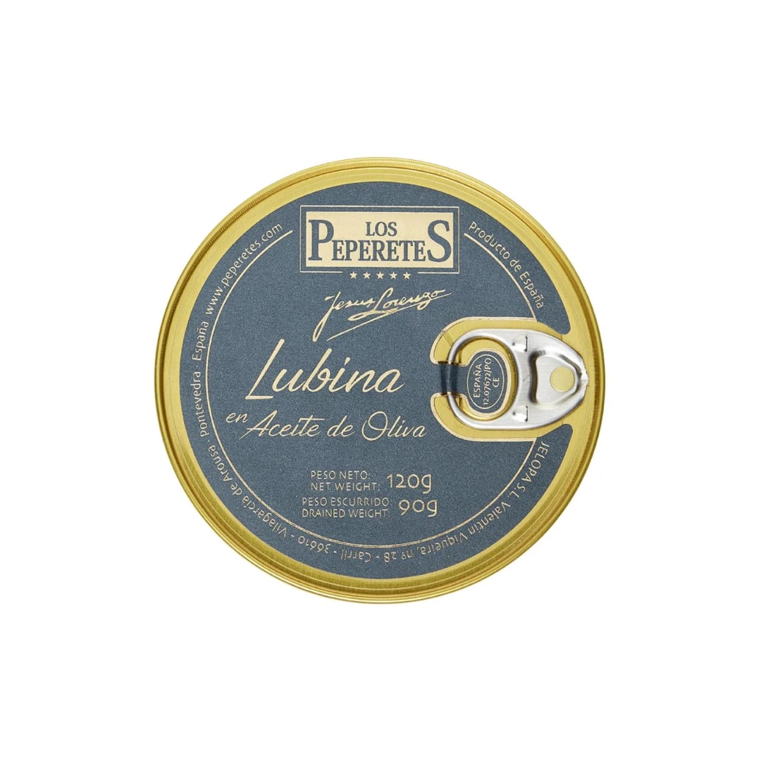 Los Peperetes provides a gourmet experience with their Sea Bass Fillets in Olive Oil, packaged in a 120g round tin (90g drained weight). The simple design features gold and navy colors and includes a pull tab for easy opening.